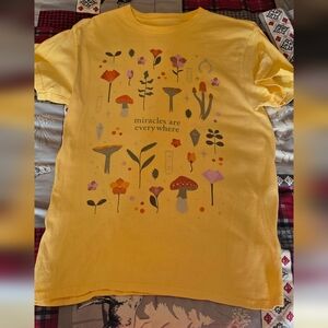 Yellow Graphic T-Shirt with Floral Design